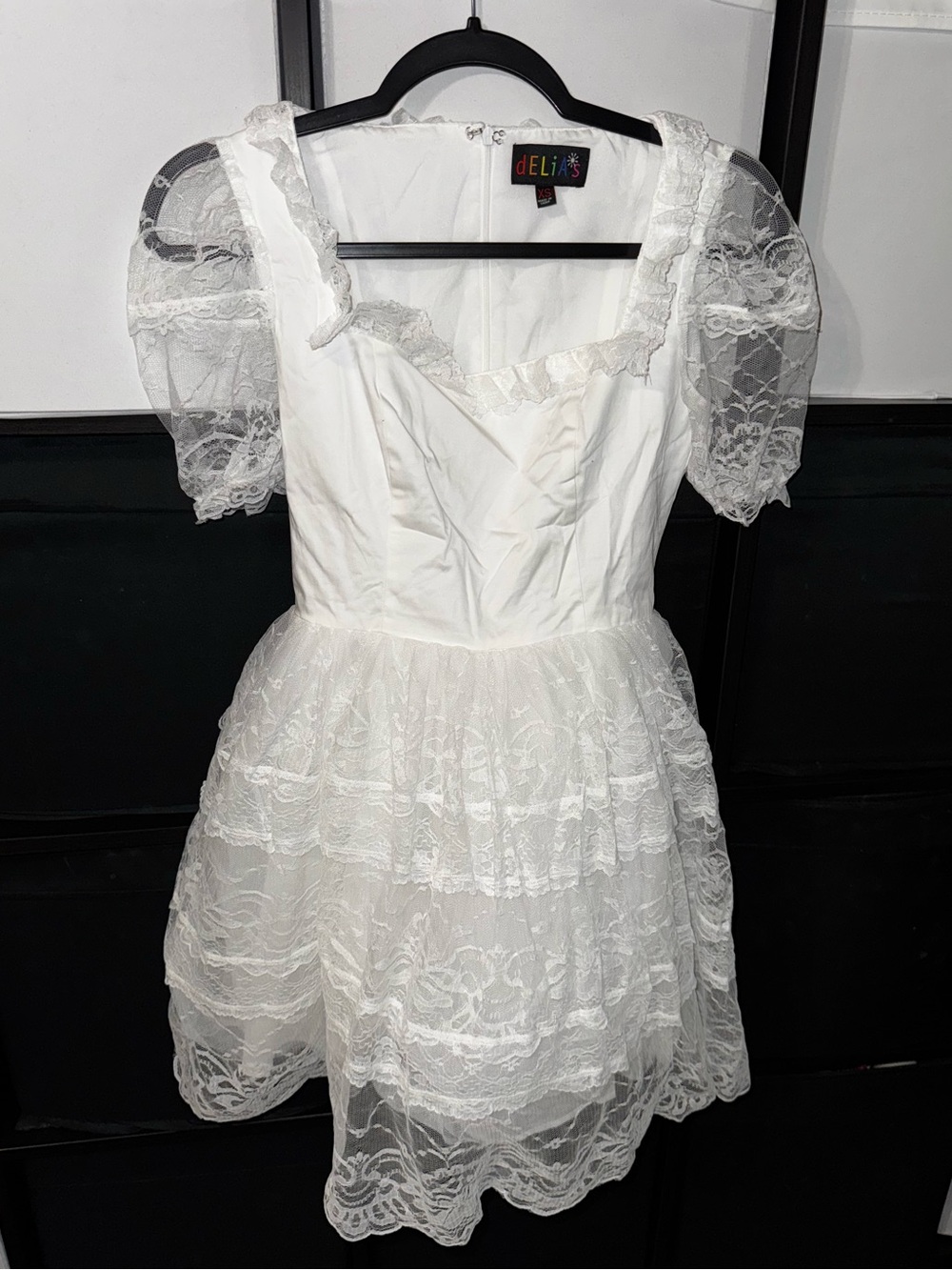 Delia’s little white dress lace skirt and sleeves - new size XS - pretty cute